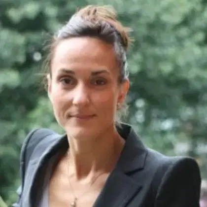 Profile picture of a woman in a suit